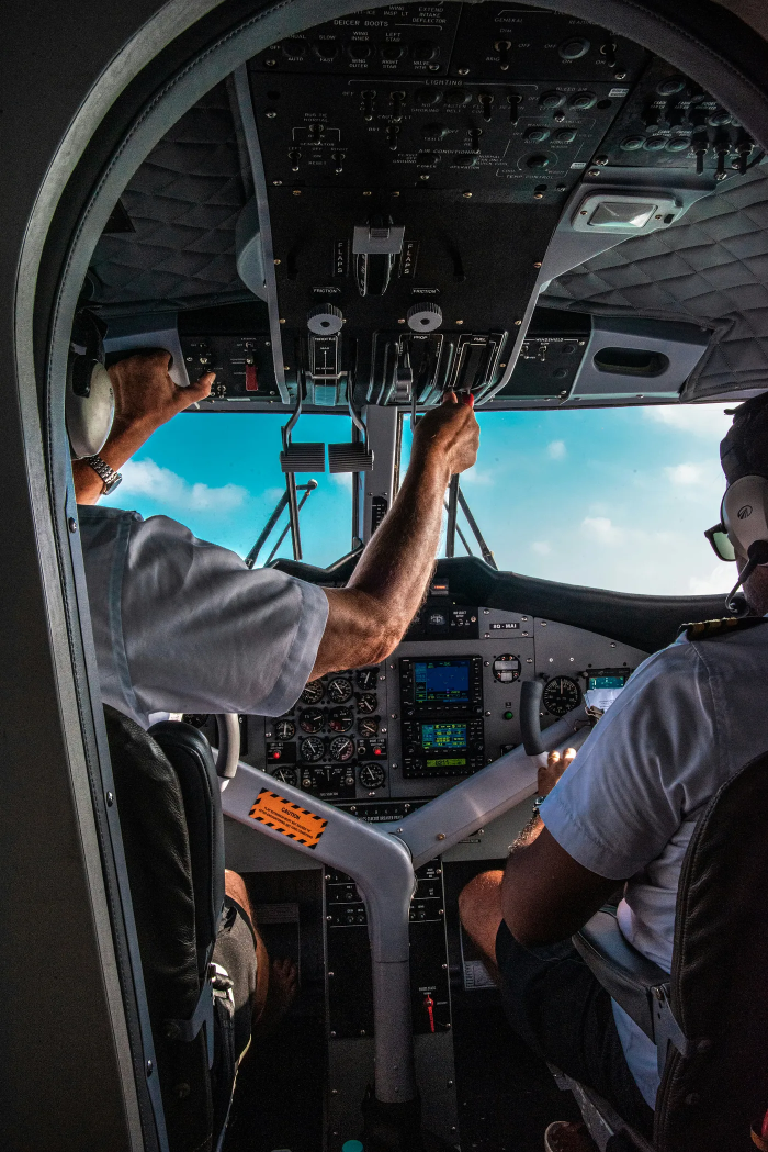 Pilots in a cockpit of an airplane