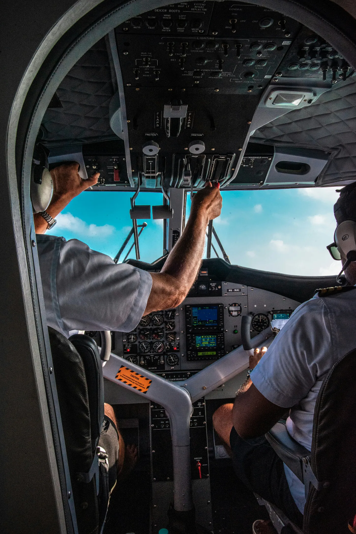 Pilots in a cockpit of an airplane Pilots in a cockpit of an airplane